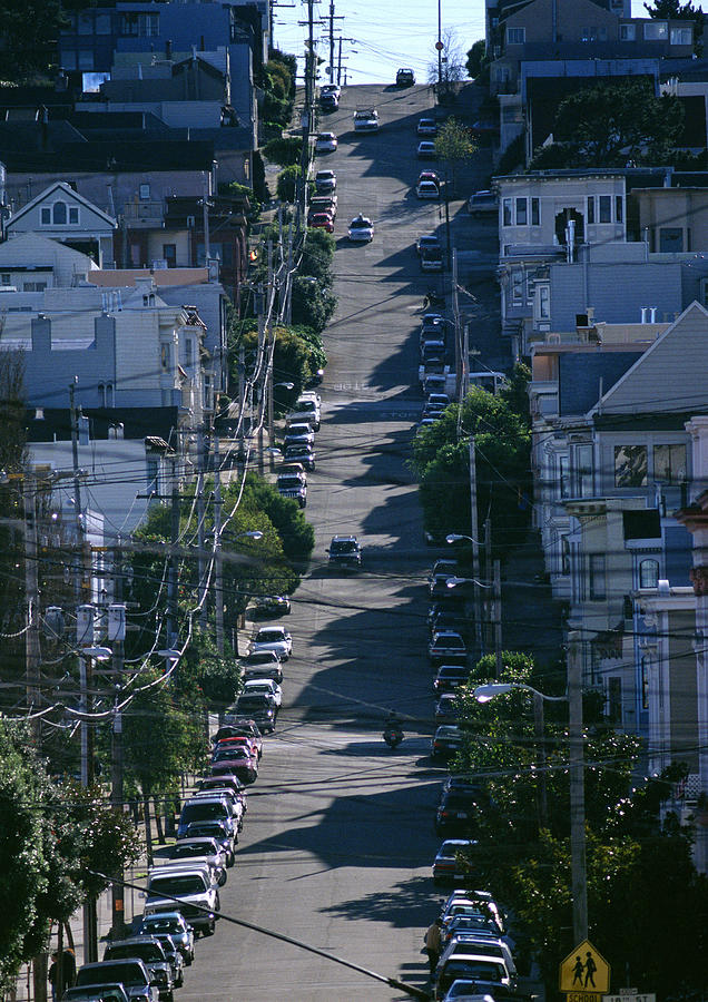 California, San Francisco, city street with cars lining road Photograph by Frederic Cirou
