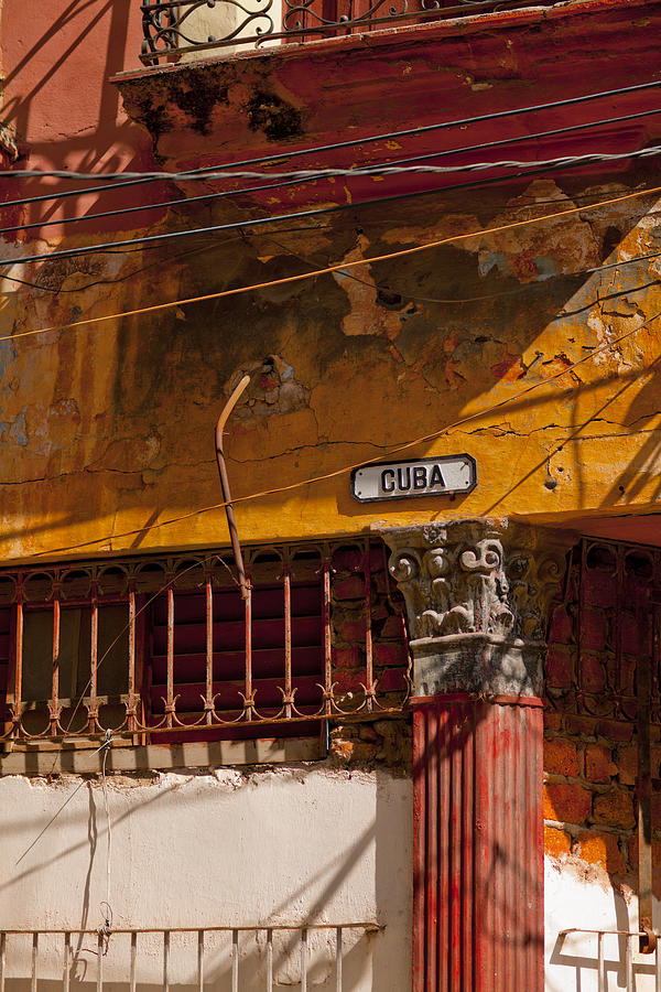 Calle Cuba sign on eroded wall Photograph by Merten Snijders