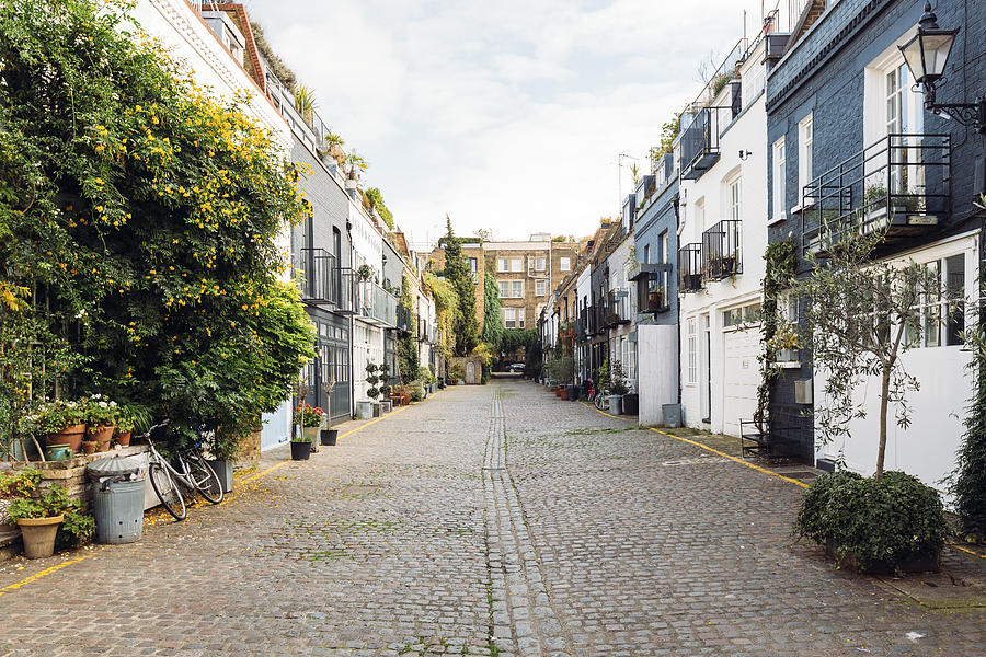 Calm street with mews houses in Notting Hill, London, Greater London, UK Photograph by Alexander Spatari