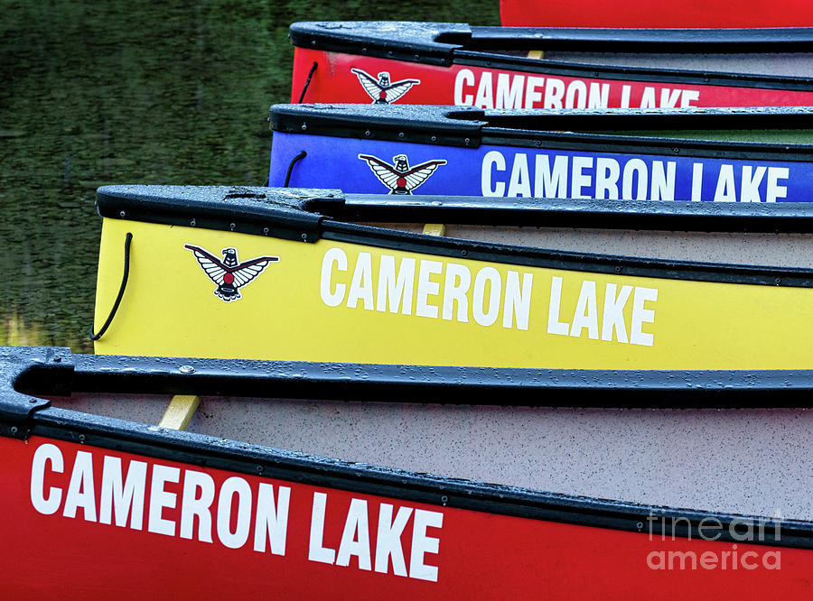 Cameron Lake Canoes Photograph by Jerry Fornarotto