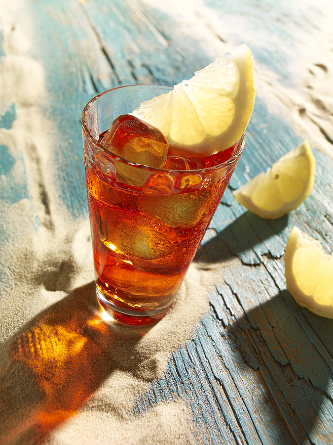 Campari with lemon slice Photograph by Westend61