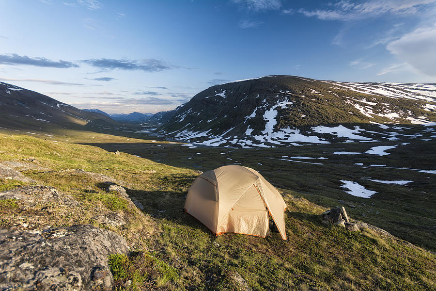 Camping tent in remote landscape Photograph by Patrick Lienin