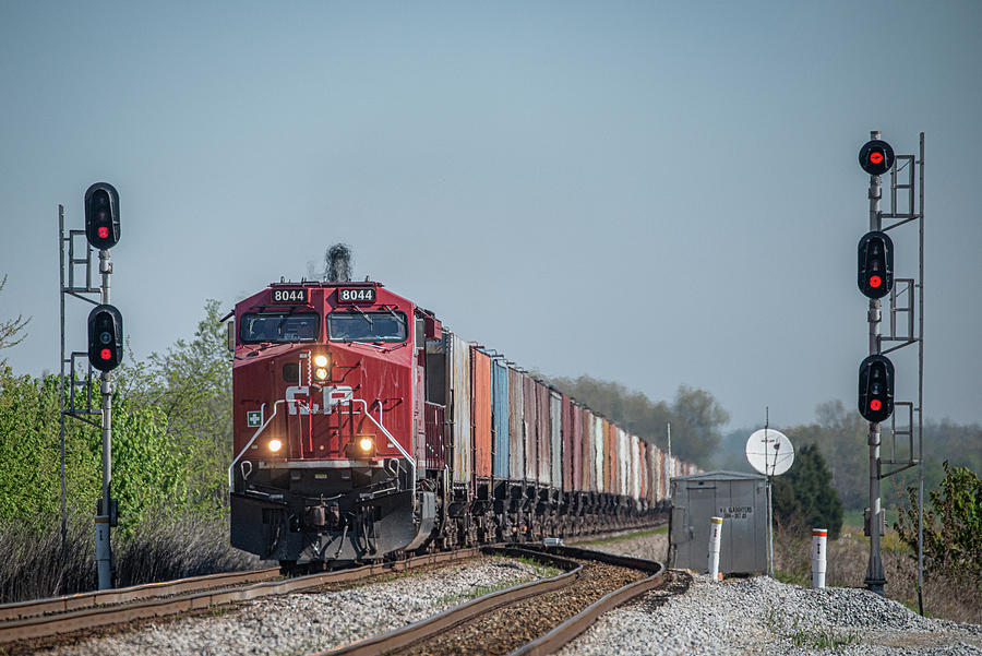 Canadian Pacific 8044 leads an empty phosphate train Photograph by Jim Pearson