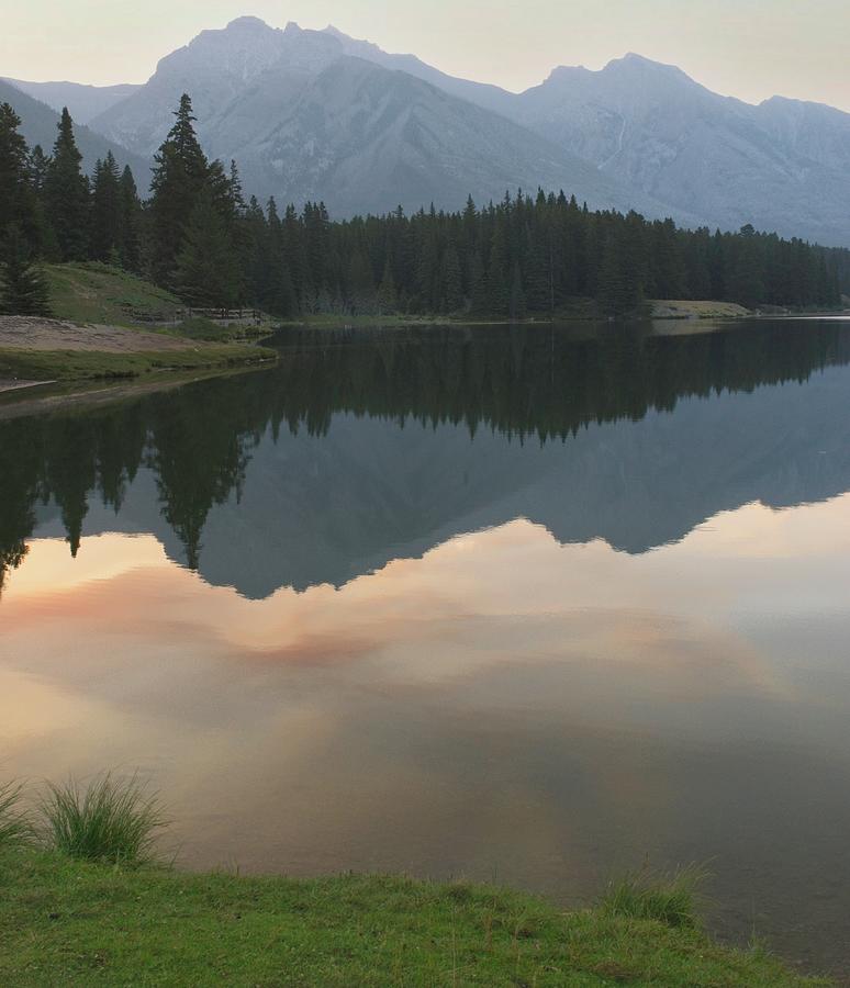 Canadian Rockies Reflected in a Quiet Lake Photograph by Douglas Barnett