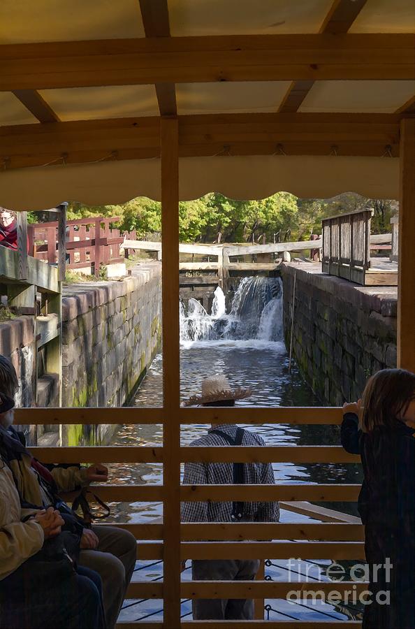 Canal boat and reenactors enter the lock at Great Fall Tavern on the C and O Canal in Maryland USA Photograph by William Kuta