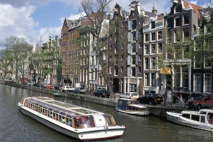 Boat Photograph - Canalboat on a canal in Amsterdam Netherlands by Robert Ford