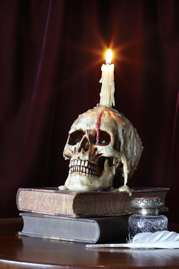 Candle and Skull on Books Photograph by Jeffrey Coolidge