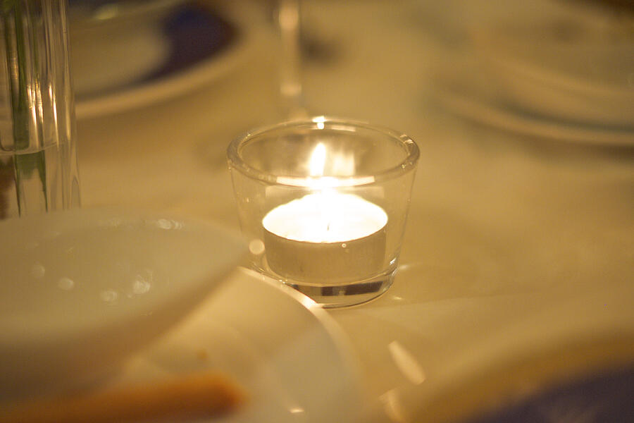Candle light on the table Photograph by Keiko Iwabuchi