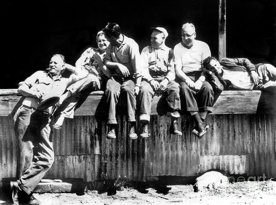 Cannery Photograph - Canney workers take a brake on the loading dock of Hovden Cannery 1950 by Monterey County Historical Society