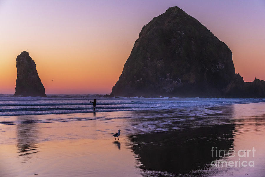Cannon Beach Sunset Fisherman And Seagull Photograph