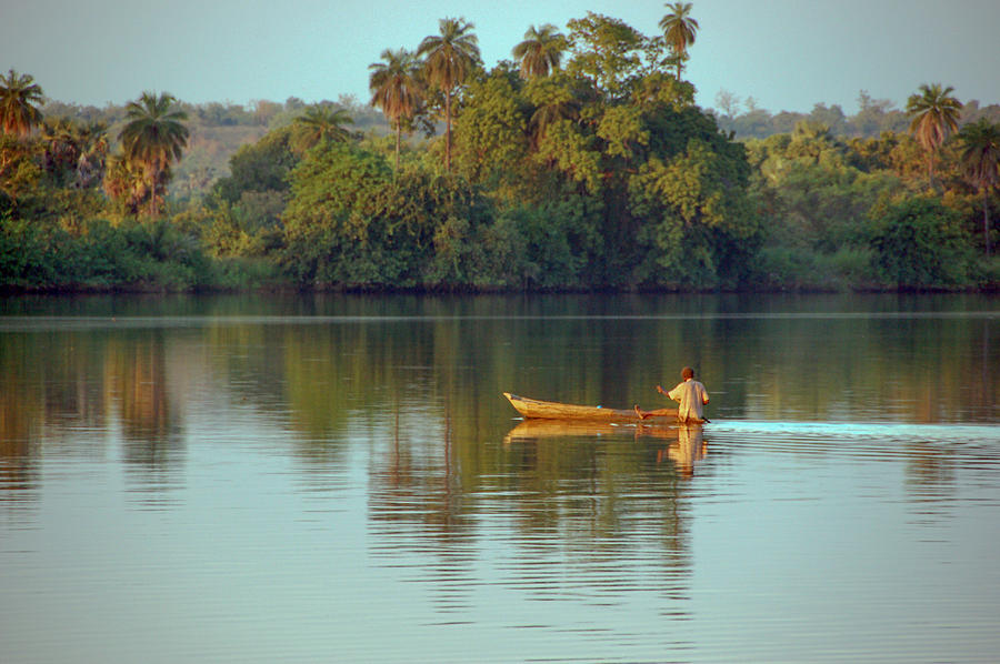 Canoe along the river Photograph by Xavi Talleda · Photo collection · (C)