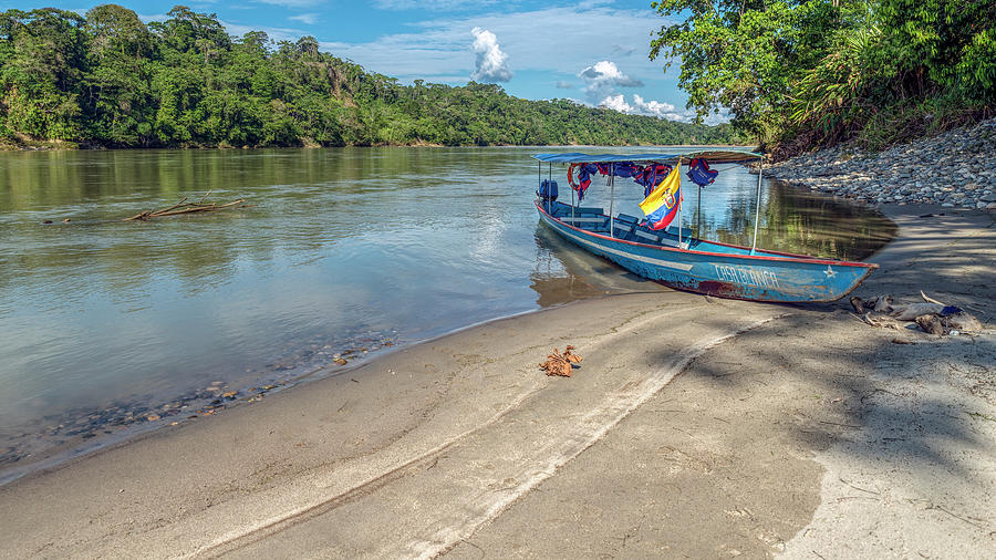 Canoe and beach on the Amazon Napo river Photograph by Henri Leduc