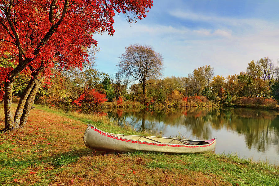 Canoe at Schramm Park - Autumn Photograph by Nikolyn McDonald