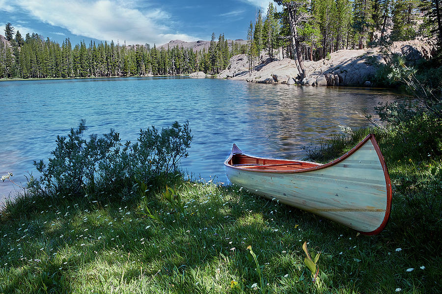 Canoe in Lake Tahoe Photograph by Jon Glaser