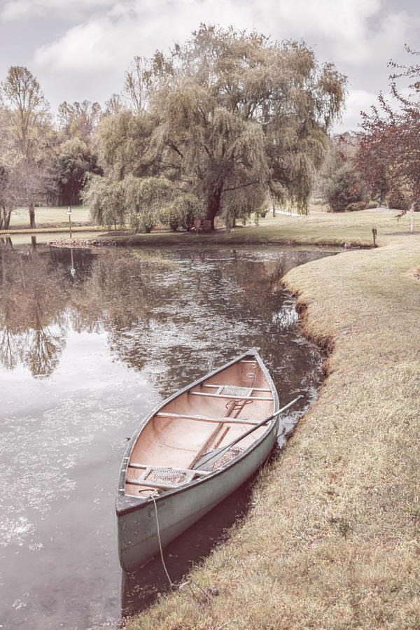 Canoe in Spring in Soft Hues Photograph by Debra and Dave Vanderlaan