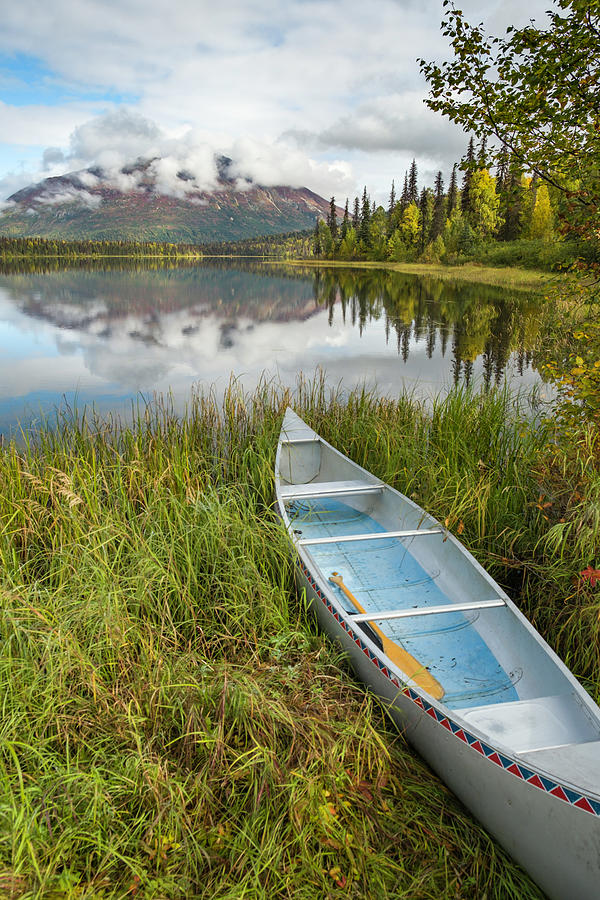 canoe on lakeshore Alaska Photograph by David L Moore