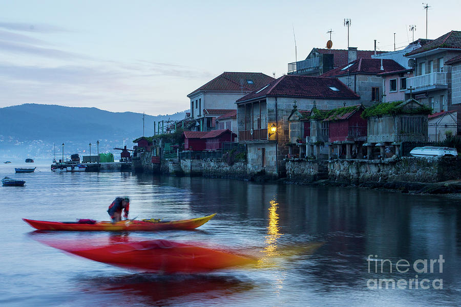 Canoes at Fishing Town of Combarro in Pontevedra Estuary at Low Tide Galicia Photograph by Pablo Avanzini