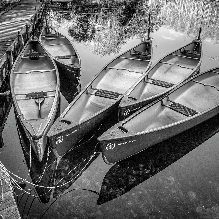 Boat Photograph - Canoes Floating at the Dock Black and White by Debra and Dave Vanderlaan