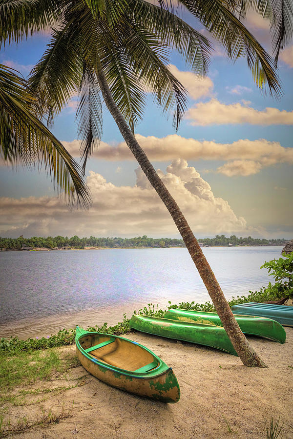 Canoes Waiting on the Beach Photograph by Debra and Dave Vanderlaan