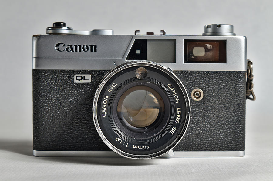 Canon analogue camera, model Canonet QL19. 35mm film Camera Front Photograph by Angelo DeVal