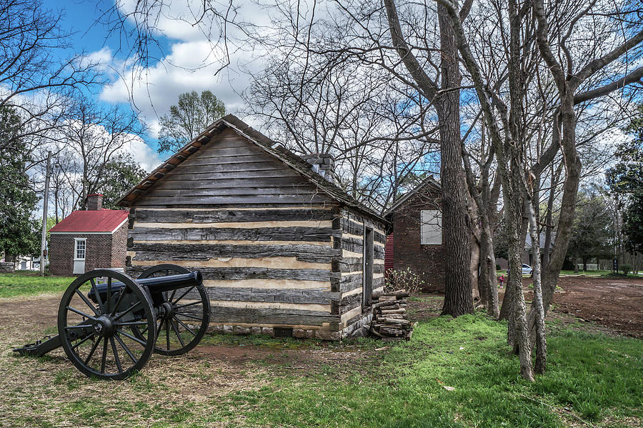 Canon and log cabin Photograph by John Pacetti - Fine Art America