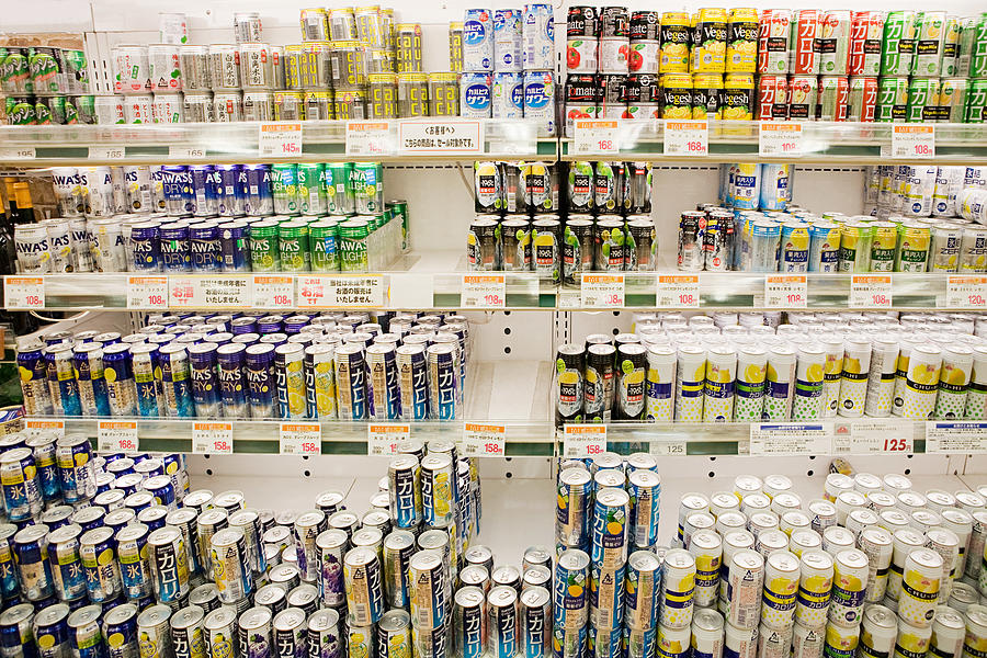 Cans of chuhai in a supermarket fridge Photograph by Image Source