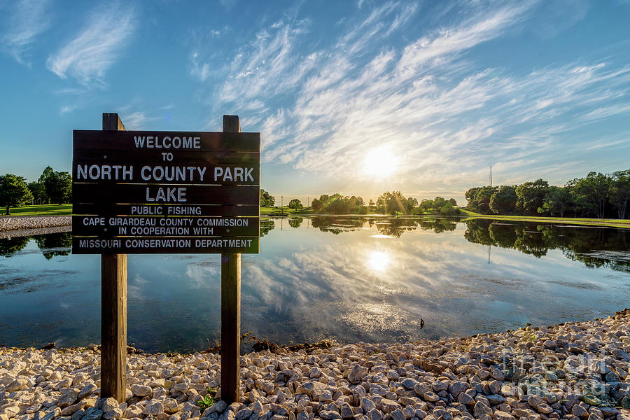 Sunset Photograph - Cape Girardeau North County Park Lake Sign by Jennifer White
