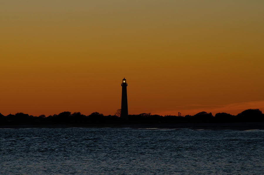 Cape May Lighthouse at Sunset Silhouette Photograph by Bill Cannon