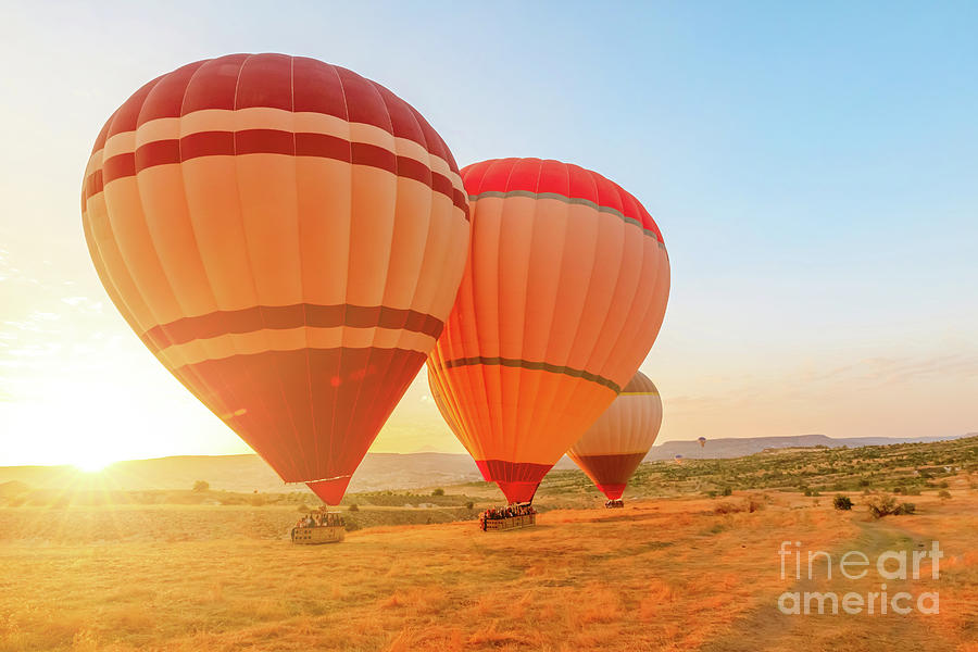 Cappadocia air balloons flying at dawn in Turkey Digital Art by Benny Marty