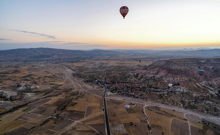 Cappadocia, Turkey - Wide angle Panorama aerial shot of colorful hot air balloons together floating  Photograph by Arpan Bhatia