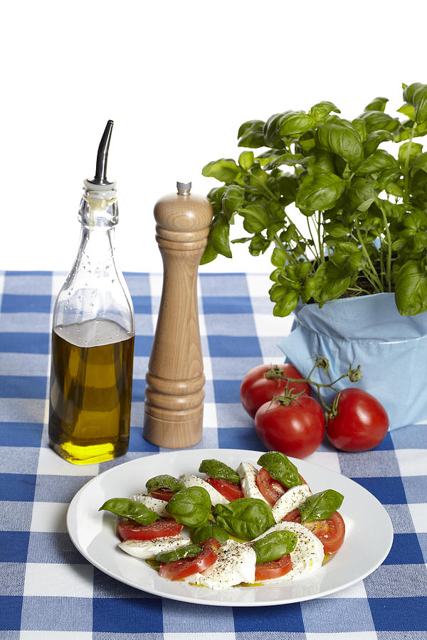 Caprese - mozzarella, tomatoes and basil Photograph by Schulzhattingen