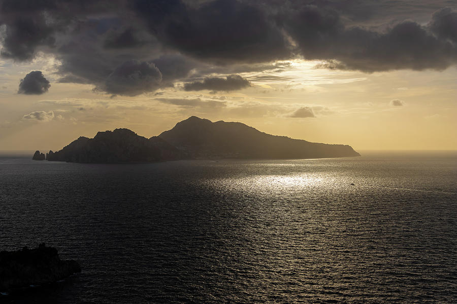 Capri at sunset Photograph by Radek Kucharski