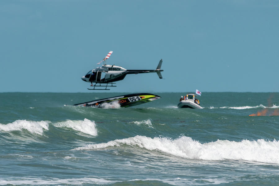Capsized Racing Powerboat Rescue Photograph by Bradford Martin