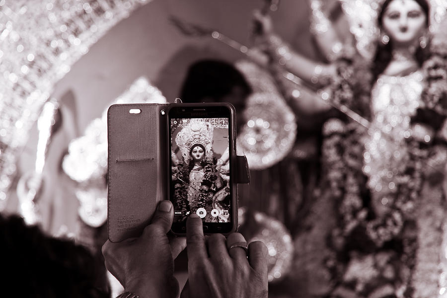 Capturing goddess durga in mobile Photograph by Kuntal Saha