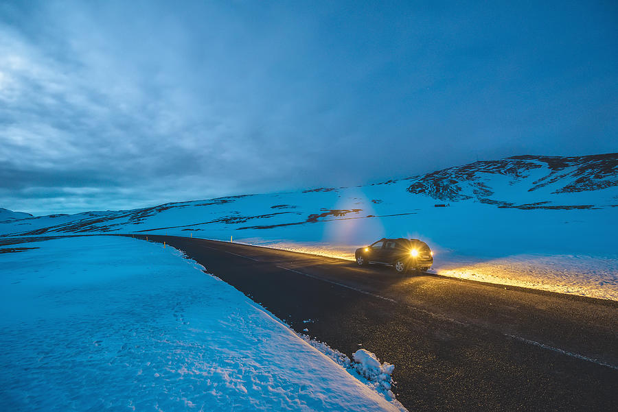 Car stopped on road in winter Photograph by Carlos Fernandez