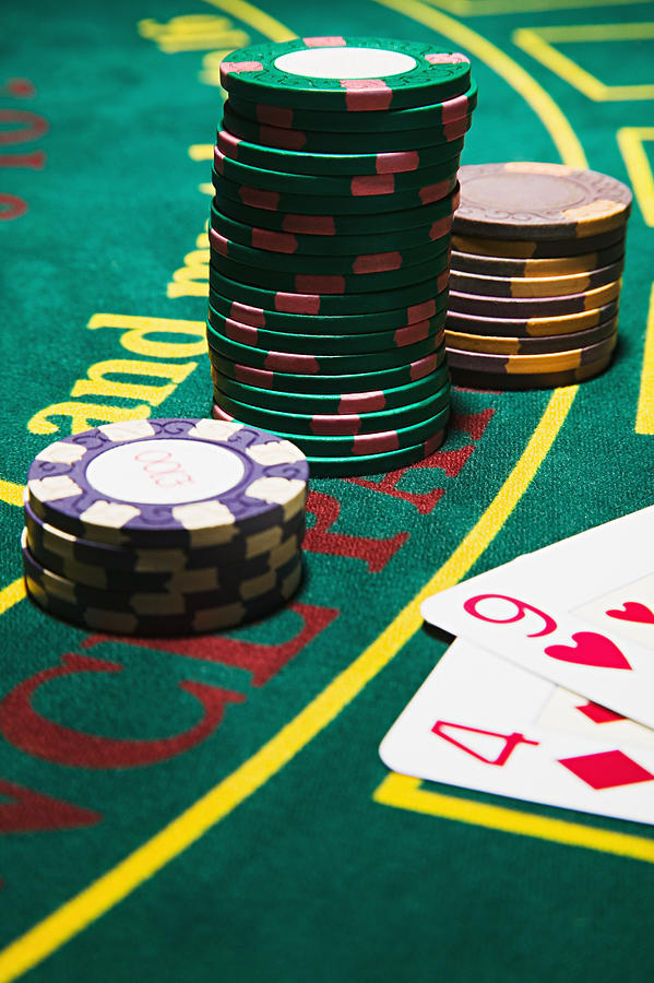 Cards and gambling chips Photograph by Image Source