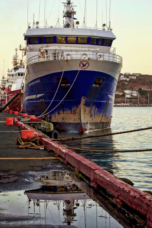 Cargo boat puddle reflection Photograph by Tatiana Travelways