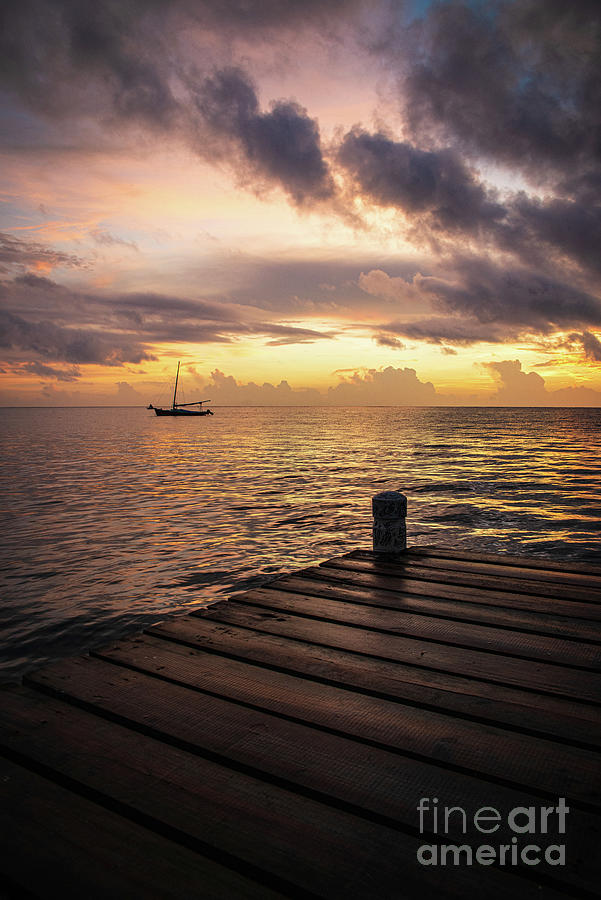 Caribbean sunset Photograph by Yuri Santin