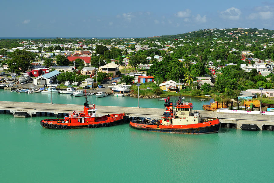 Caribbean Tugboats with Antigua Skyline Photograph by Luke Moore