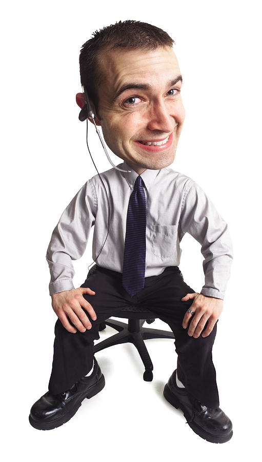 Caricature Of A Young Goofy Male Telemarketer As He Flashes A Cheesy Smile Photograph by Photodisc