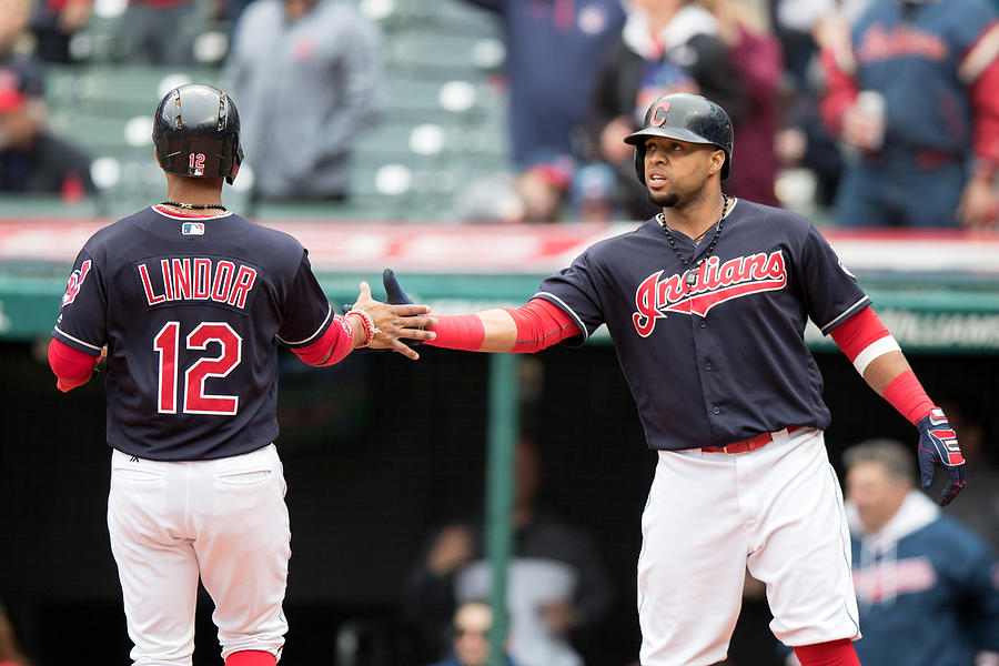 Carlos Santana and Francisco Lindor Photograph by Icon Sportswire