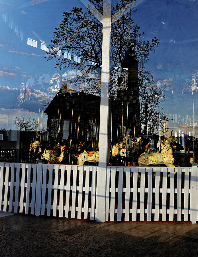 Carousel reflecting Five Mile Point Lighthouse Photograph by Doolittle Photography and Art