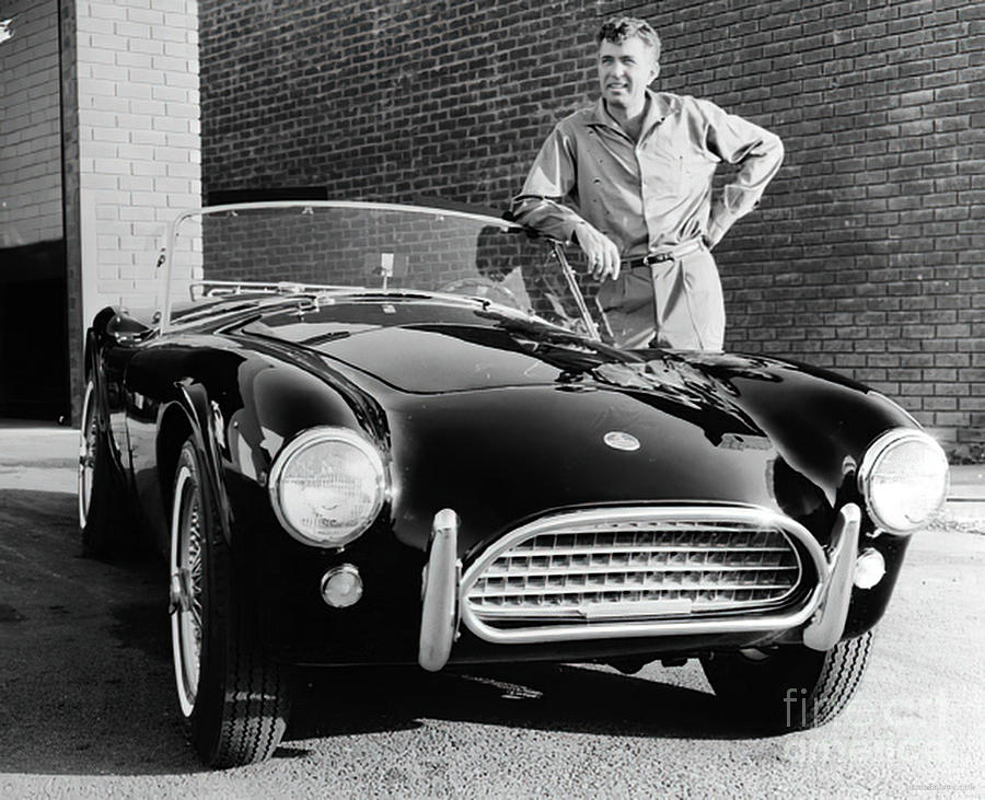 Carroll Shelby and 1965 AC Cobra Photograph by Retrographs