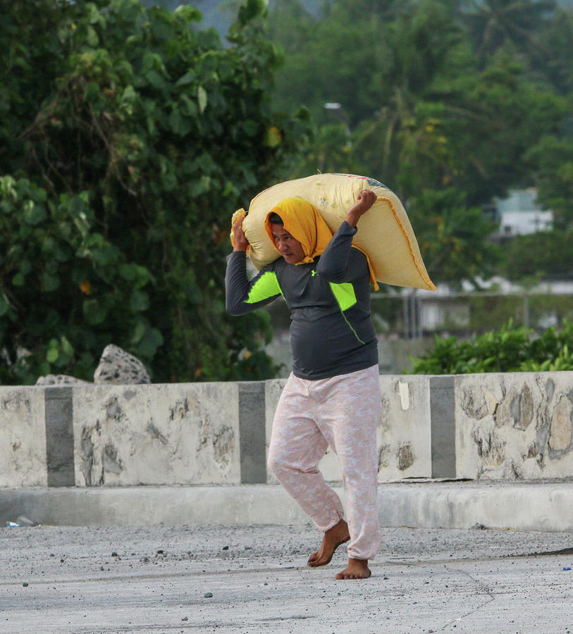 Carrying a Sack of Rice Photograph by William E Rogers Pixels