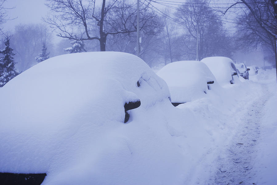 Cars covered in snow Photograph by Nash Photos