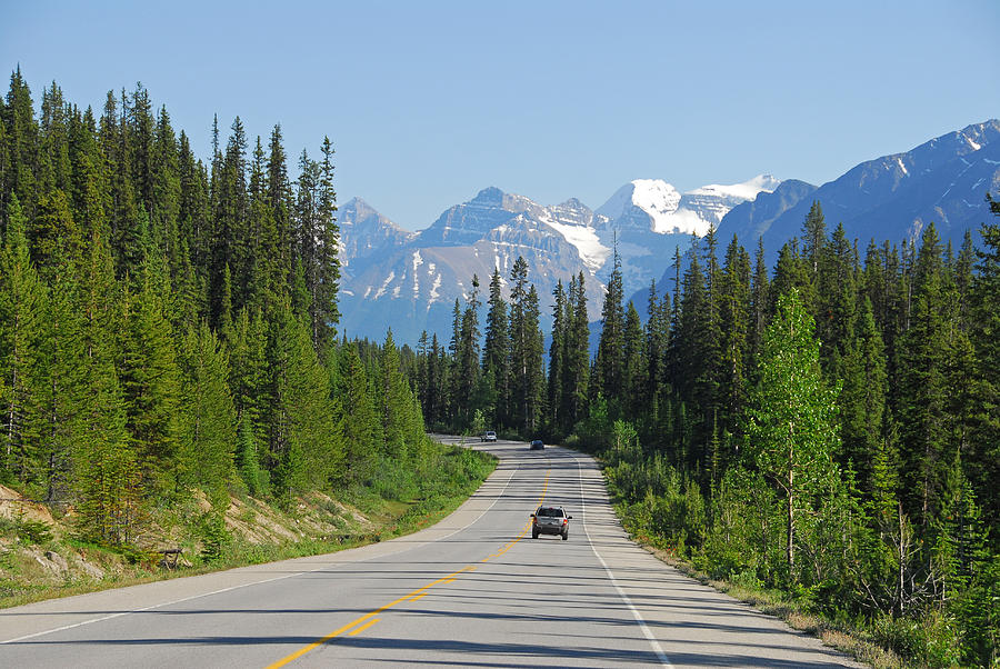 Cars driving the Icefields Parkway in Jasper National Park,Canada Photograph by Brytta