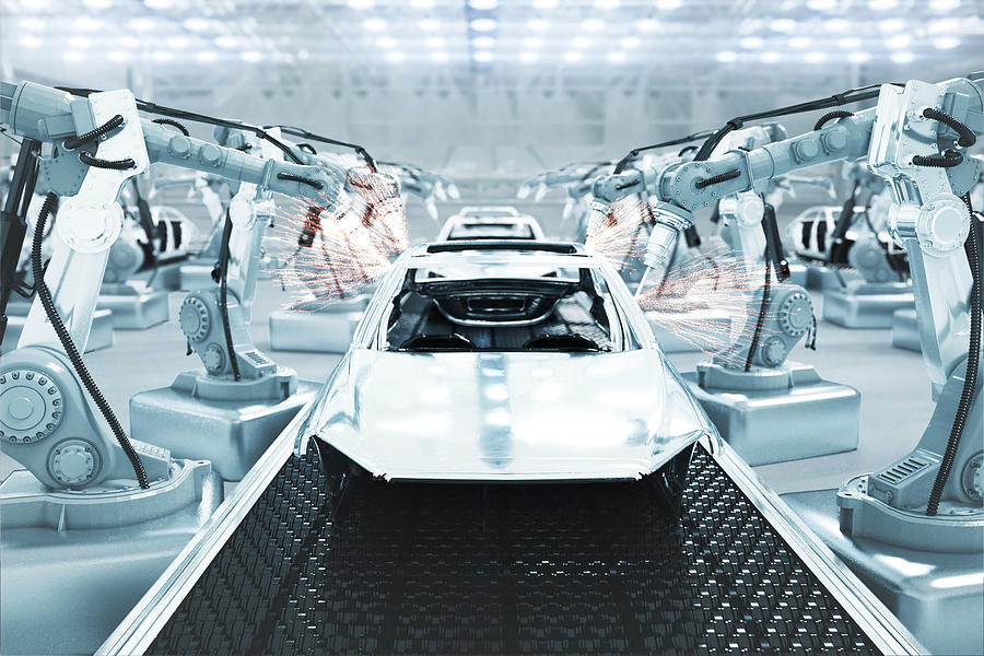 Cars on futuristic assembly automotive manufacturing line Photograph by Yuichiro Chino