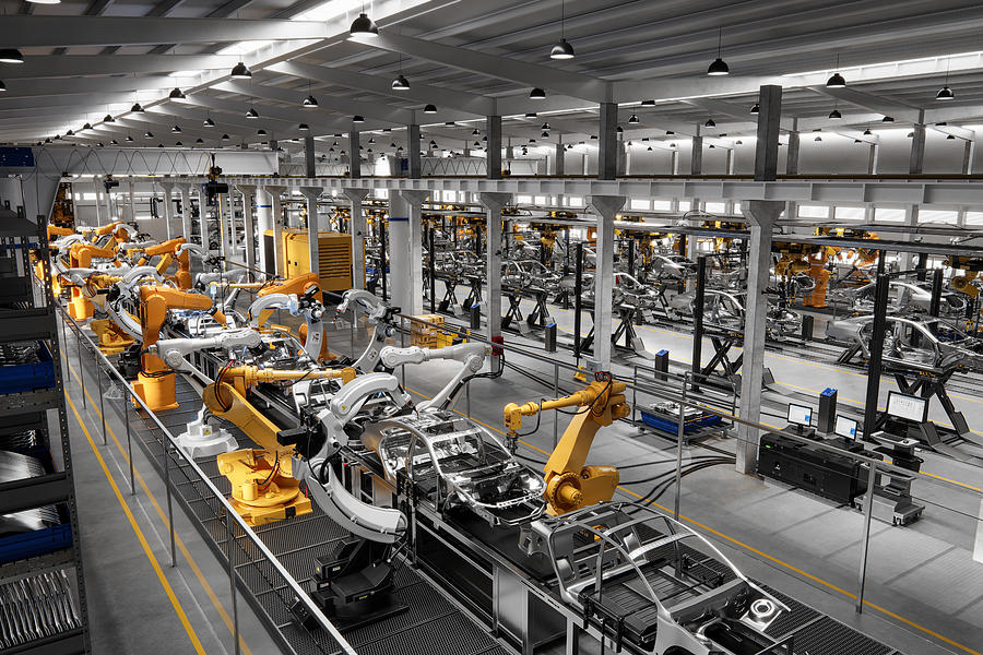 Cars on production line in factory Photograph by Alvarez