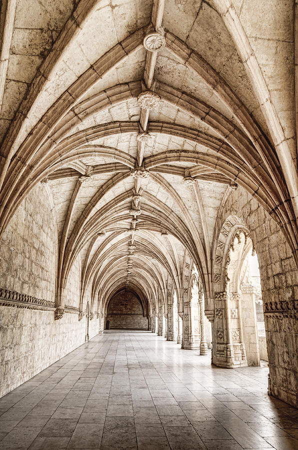 Carved arched corridor in monastery Photograph by OGphoto