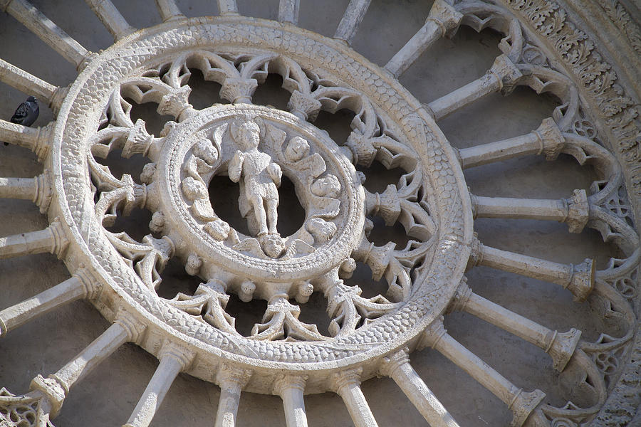 Carved stone rose window on the Ostuni Cathedral Photograph by Hal Beral